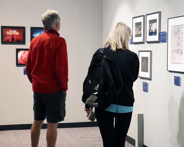 Visitors check out Storytellers exhibit